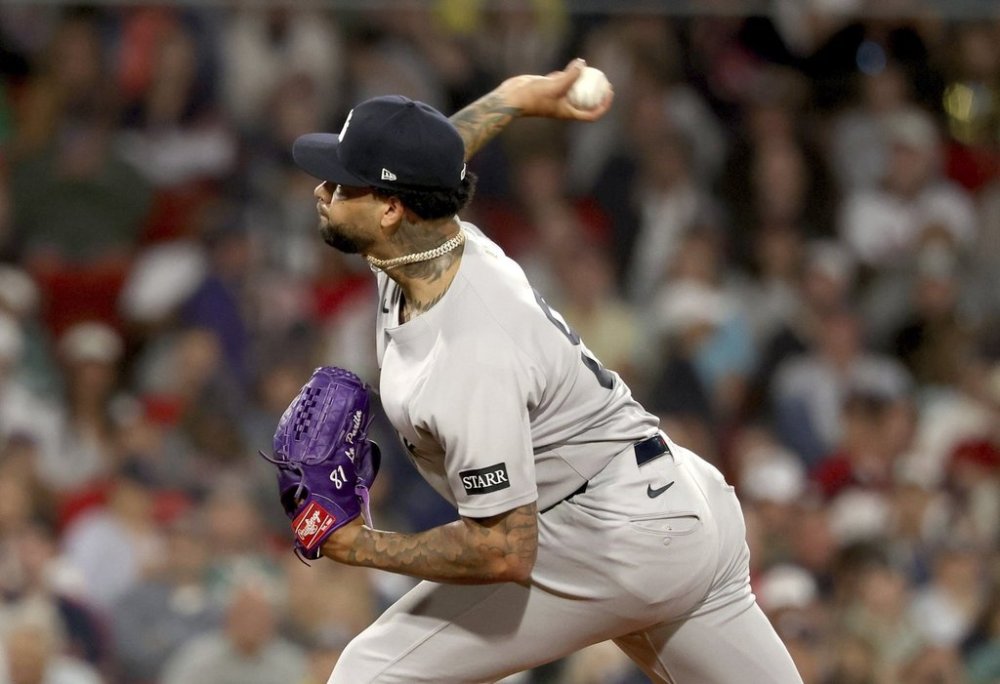 New York Yankees pitcher Luis Gil throws during the first inning of a baseball game against the Boston Red Sox, Friday, Sept. 12, 2025, in Boston. (AP Photo/Mark Stockwell)