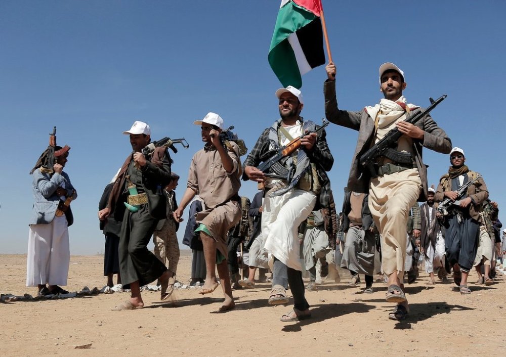 FILE - Houthi fighters march during a rally of support for the Palestinians in the Gaza Strip and against the U.S. strikes on Yemen outside Sanaa on Jan. 22, 2024. (AP Photo, File)
