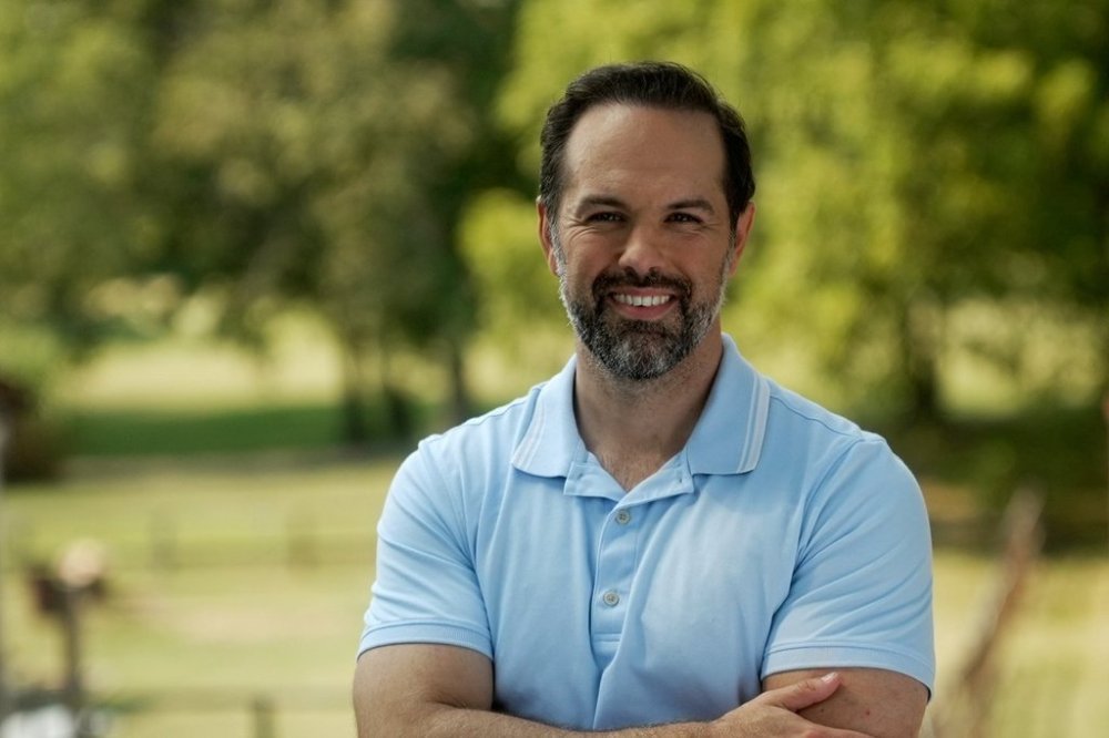 In this photo released by Joel Willett, U.S. Senate candidate Joel Willett poses for a photo on Sept. 11, 2025, in Valley Station, a suburb of Louisville, Ky. (Joe Willett via AP)