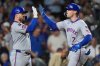 New York Mets' Brett Baty, right, celebrates with Luis Torrens after hitting a three-run home run during the fourth inning of a baseball game against the Chicago Cubs in Chicago, Thursday, Sept. 25, 2025. (AP Photo/Nam Y. Huh)