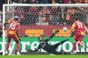 Galatasaray's Victor Osimhen shoots a penalty kick to score the opening goal during the Champions League opening phase soccer match between Galatasaray and Liverpool at the Ali Sami Yen stadium, in Istanbul, Turkey, Tuesday, Sept. 30, 2025. (AP Photo/Francisco Seco)