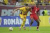 Romania's Alexandru Dobre, left, challenges for the ball with Canada's Ismael Kone during an international friendly soccer match between Romania and Canada at the National Arena stadium in Bucharest, Romania, Friday, Sept. 5, 2025. (AP Photo/Andreea Alexandru)