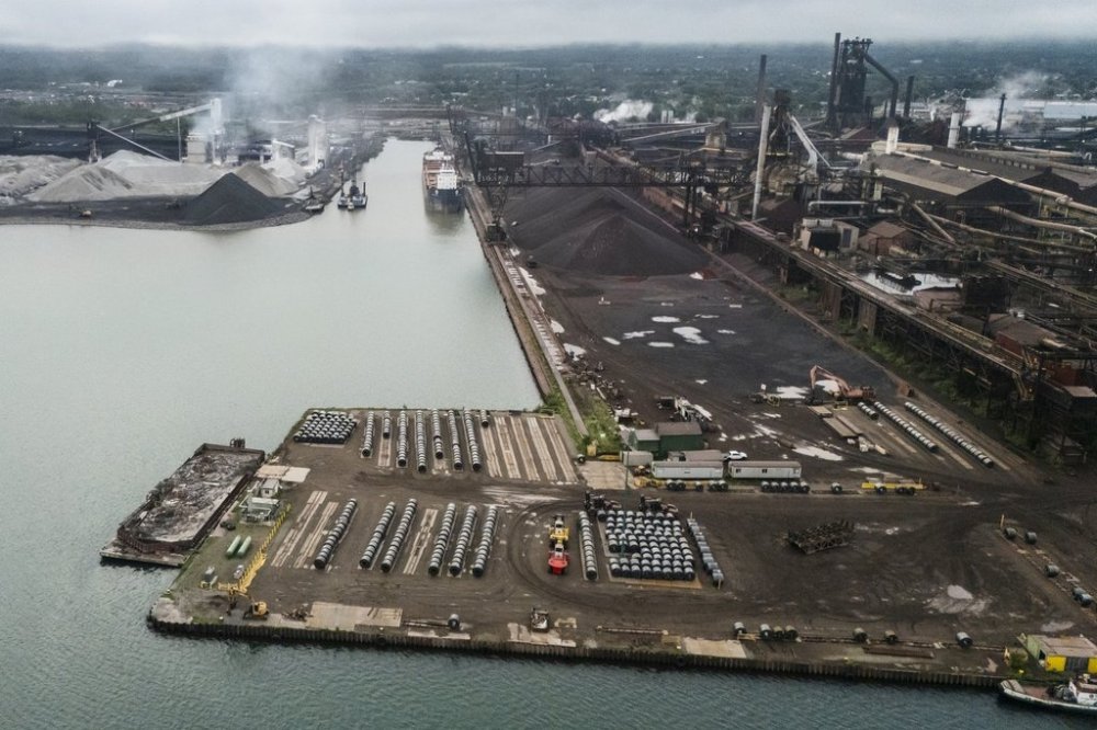 Rolled coils of steel sit in the yard at Algoma Steel Inc., the second largest steel producer in Canada, along the St. Marys River in Sault Ste. Marie, Ont., Thursday, July 24, 2025. THE CANADIAN PRESS/Nick Iwanyshyn