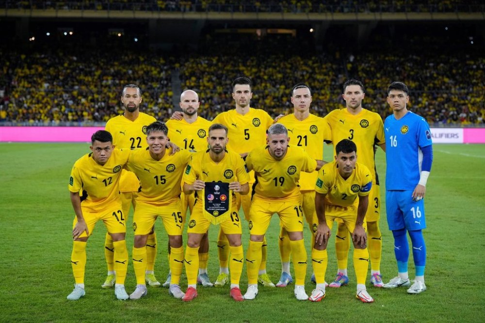 FILE - Malaysia's players pose before the start of the AFC Asian Cup qualifier Group F soccer match between Malaysia and Vietnam at the National Stadium Bukit Jalil in Kuala Lumpur Malaysia, on June 10, 2025. (AP Photo/Vincent Thian, File)