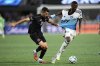 Inter Miami midfielder Sergio Busquets (5) defends against Charlotte FC midfielder Djibril Diani (28) during the first half of an MLS soccer match, Saturday, Sept. 13, 2025, in Charlotte, N.C. (AP Photo/Erik Verduzco)