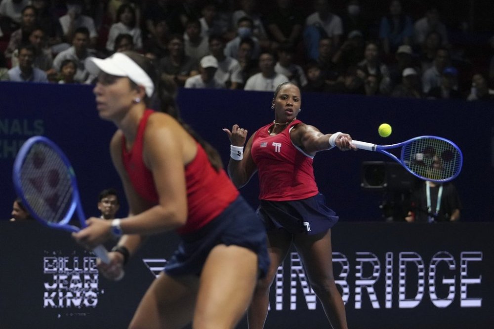 Taylor Townsend and Jessica Pegula, of the United States play against Elena Rybakina and Yulia Putintseva, of Kazakhstan during the Billie Jean King Cup quarterfinals tennis doubles match, at the Shenzhen Bay Sports Center Arena, in Shenzhen, China's Guangdong province, Thursday, Sept. 18, 2025. (AP Photo/Andy Wong)