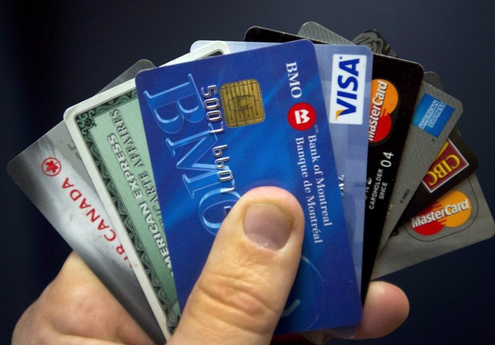 Credit cards are displayed in Montreal, Wednesday, Dec. 12, 2012. THE CANADIAN PRESS/Ryan Remiorz