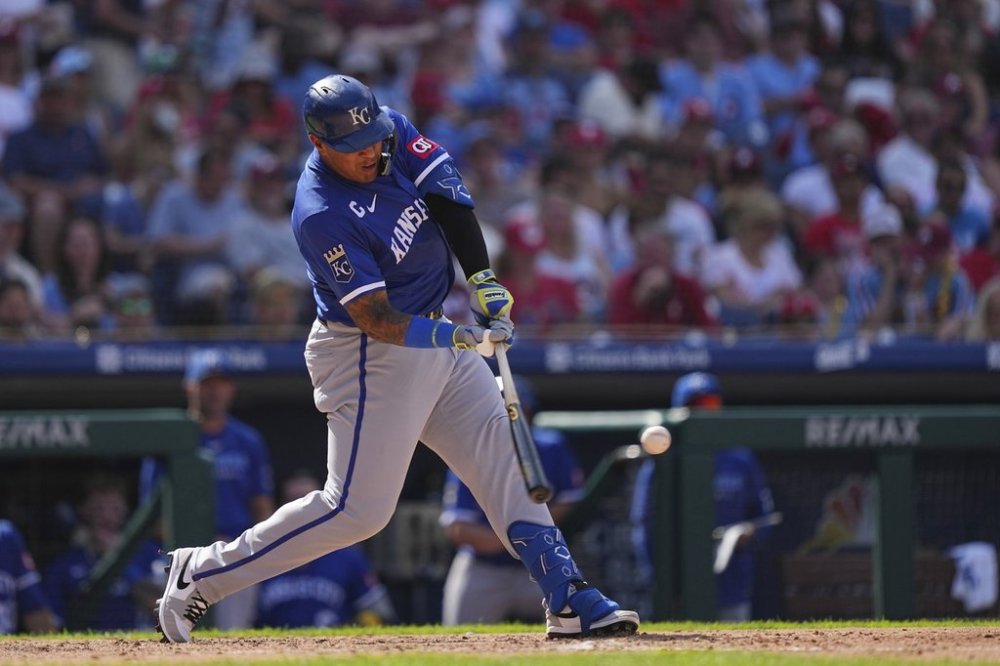 Kansas City Royals' Salvador Perez hits a there-run home run off of Philadelphia Phillies pitcher Aaron Nola during the sixth inning of a baseball game, Sunday, Sept. 14, 2025, in Philadelphia. (AP Photo/Matt Rourke)