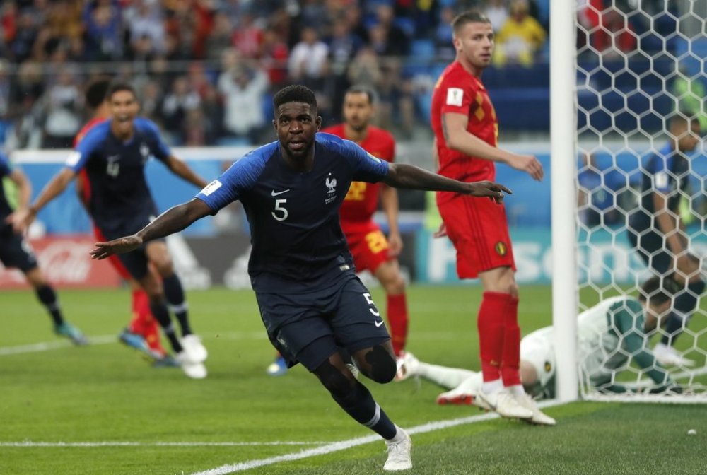 FILE - France's Samuel Umtiti celebrates after scoring his sides 1st goal of the game during the semifinal match between France and Belgium at the 2018 soccer World Cup in the St. Petersburg Stadium in, St. Petersburg, Russia, Tuesday, July 10, 2018. (AP Photo/Natacha Pisarenko, File)