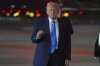 President Donald Trump gestures as he arrives on Air Force One at John F. Kennedy International Airport on Monday, Sept. 22, 2025, in New York. (AP Photo/Evan Vucci)