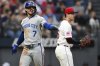 Kansas City Royals' Bobby Witt Jr. celebrates after scoring a run on an RBI single by Vinnie Pasquantino during the third inning of a baseball game against the Cleveland Guardians, Wednesday, Sept. 10, 2025, in Cleveland. (AP Photo/David Dermer)