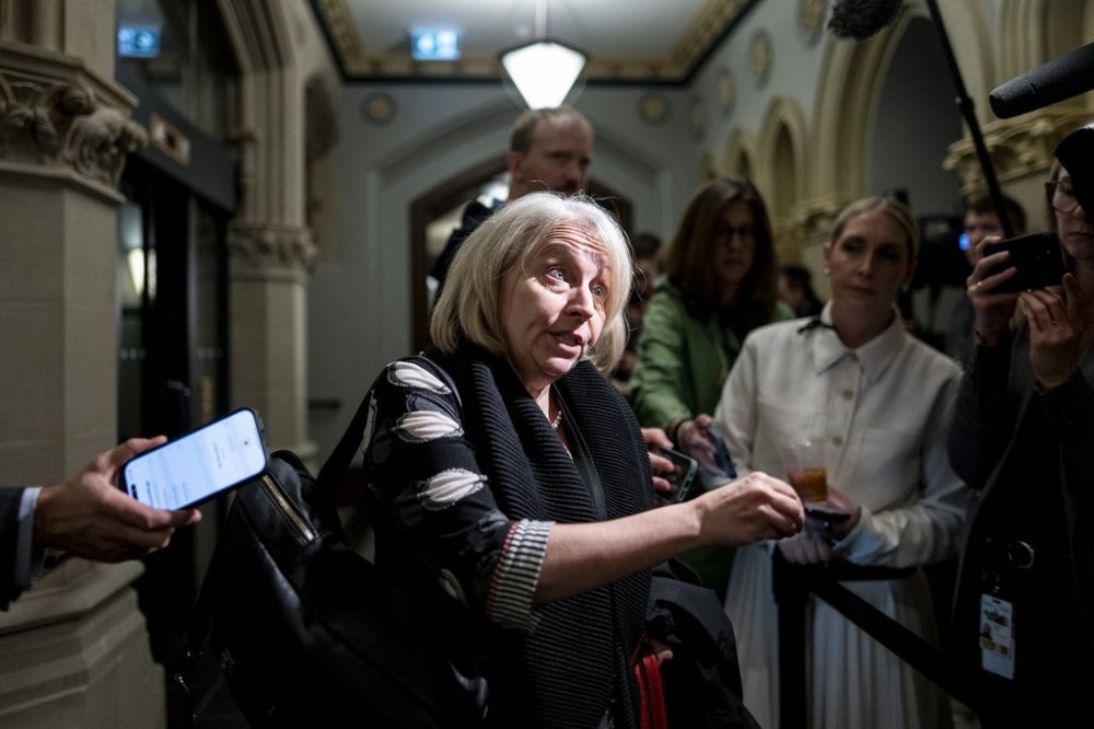 National Security and Intelligence Adviser to the Prime Minister and Deputy Clerk of the Privy Council Nathalie Drouin speaks to reporters ahead of a cabinet meeting on Parliament Hill in Ottawa on Thursday, Sept. 25, 2025. THE CANADIAN PRESS/Spencer Colby