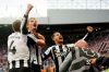 Newcastle United's Nick Woltemade celebrates scoring their side's first goal of the game during their English Premier League soccer match against Arsenal at St. James' Park, Newcastle upon Tyne, England, Sunday, Sept. 28, 2025. (Owen Humphreys/PA via AP)