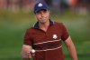 Europe's Viktor Hovland waves after making a putt on the second hole at Bethpage Black golf course during the Ryder Cup golf tournament, Saturday, Sept. 27, 2025, in Farmingdale, N.Y. (AP Photo/Seth Wenig)
