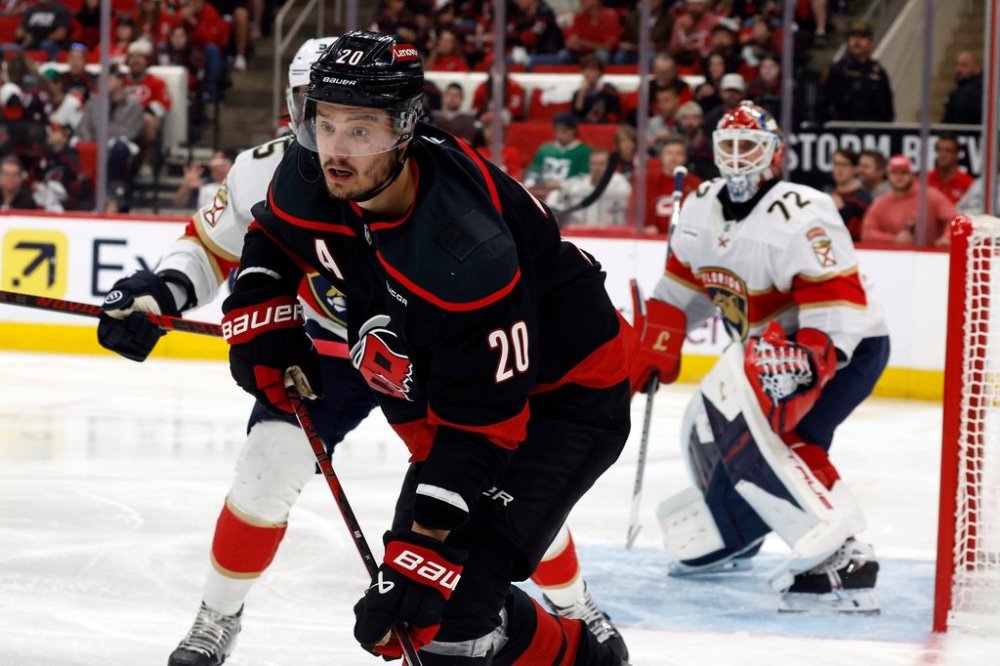 FILE - Carolina Hurricanes' Sebastian Aho (20) watches the puck in front of Florida Panthers goaltender Sergei Bobrovsky (72) during the second period of Game 2 of the NHL hockey Stanley Cup Eastern Conference finals in Raleigh, N.C., Thursday, May 22, 2025. (AP Photo/Karl DeBlaker, File)