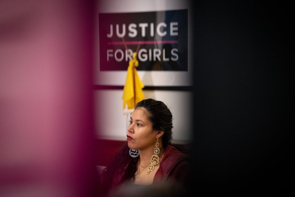 Family member Sarah Jean de Vries speaks to media during a news conference, in Vancouver, B.C., Monday, Dec. 11, 2023. THE CANADIAN PRESS/Ethan Cairns