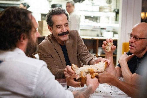 This image released by CNN shows Tony Shalhoub, center, in a scene from his series 