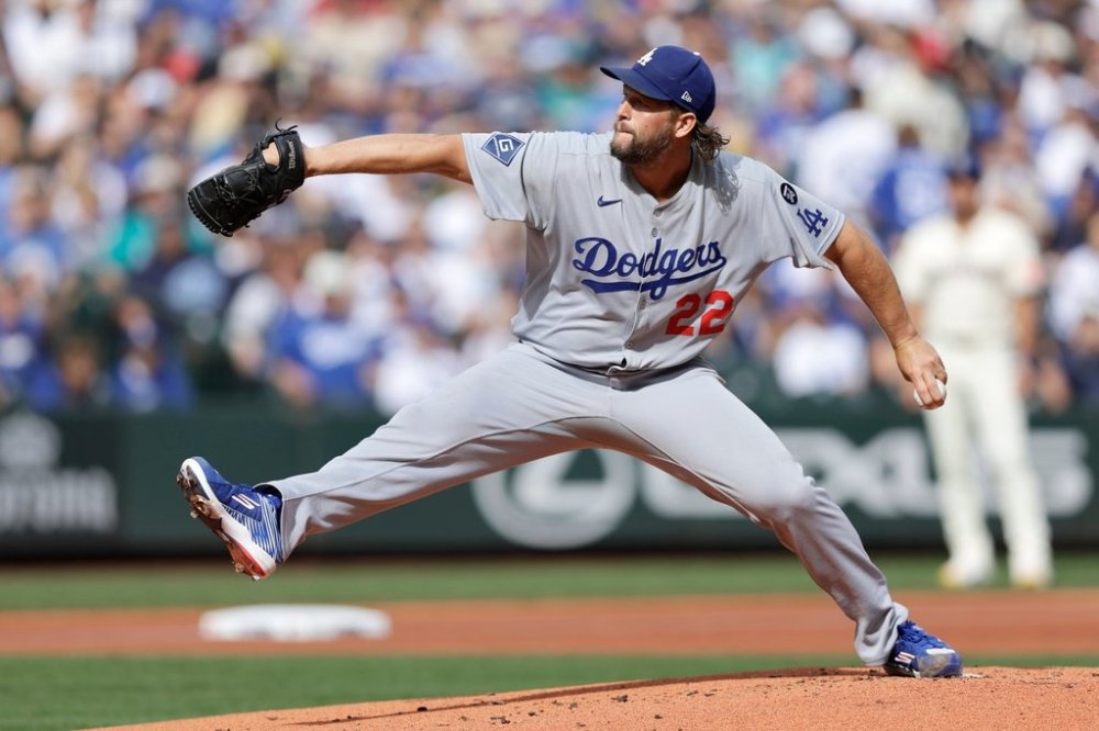 Los Angeles Dodgers pitcher Clayton Kershaw throws against the Seattle Mariners during a baseball game, Sunday, Sept. 28, 2025, in Seattle. (AP Photo/John Froschauer)