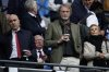 Manchster United co-owner Jim Ratcliffe stands in front of the former manager Alex Ferguson during the Premier League soccer match between Manchester City and Manchester United in Manchester, England, Sunday, Sept. 14, 2025. (AP Photo/Dave Thompson)