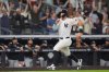 New York Yankees' Aaron Judge runs to home plate to score on a walk-off RBI single during the ninth inning of a baseball game against the Chicago White Sox Tuesday, Sept. 23, 2025, in New York. (AP Photo/Frank Franklin II)