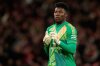 FILE - Manchester United's goalkeeper Andre Onana celebrates after teammate Mason Mount scored his side's opening goal during the Europa League semifinal second leg soccer match between Manchester United and Athletic Bilbao in Manchester, Britain, Thursday, May 8, 2025. (AP Photo/Dave Thompson, File)