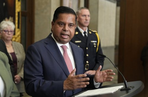 Minister of Public Safety Gary Anandasangaree speaks in the Foyer of the House of Commons on Parliament Hill in Ottawa, Tuesday, Sept. 23, 2025. Online claims that it will soon become 'criminal' to own a gun in Canada are misleading; the federal government has prohibited certain guns, but other firearms are still legal to own. THE CANADIAN PRESS/Adrian Wyld