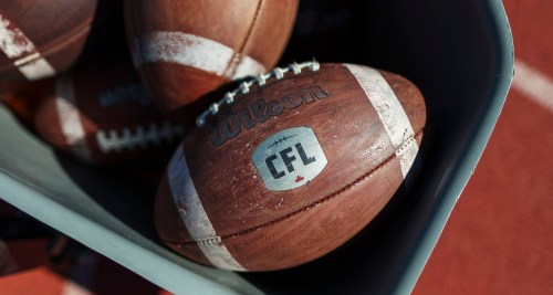 Canadian Football League logo on a football at opening day of CFL training camp in Guelph, Ont., on Sunday, May 11, 2025. THE CANADIAN PRESS/Nick Iwanyshyn