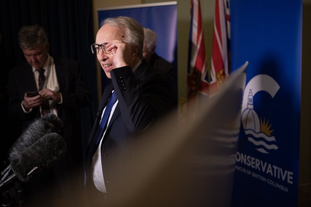 B.C. Conservative Leader John Rustad speaks to reporters following the throne speech at the legislature in Victoria, Tuesday, Feb. 18, 2025. THE CANADIAN PRESS/Chad Hipolito