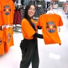 Ruth Bonneville / Free Press 

ENT - TnR shirts / Walmart

Photo of local artist, Brooklyn Rudolph-Nicholas with her designs on TnR shirts at the Walmart in Southdale.  

Story: Winnipeg Artist selected for Walmart Canada’s Orange Shirt Day Campaign
Indigenous artist Brooklyn Rudolph-Nicholas, a member of the Pimicikamak Cree Nation and granddaughter of two Residential School Survivor is the artist and designer of  Walmart ‘sCanada’s National Day for Truth & Reconciliation campaign. Her design will appear on Orange Shirts which are currently on sale Walmarts throughout the country.  

Story by AV Kitching 

Sept 19 h,  2025