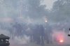 FILE - Lazio fans clash with Italian Policemen in riot gear outside the olympic stadium prior to the start of the Italian Serie A soccer match between Lazio and Roma in Rome, Sunday, April 13, 2025. (AP Photo/Gregorio Borgia, File)