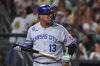 Kansas City Royals' Salvador Perez looks to the scoreboard after striking out during the fourth inning of a baseball game against the Athletics Friday, Sept. 26, 2025, in West Sacramento, Calif. (AP Photo/Sara Nevis)
