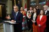 Prime Minister Mark Carney is joined by members of his cabinet and caucus as he speaks at a news conference in the Foyer of the House of Commons in Ottawa on Friday, June 20, 2025. THE CANADIAN PRESS/Justin Tang