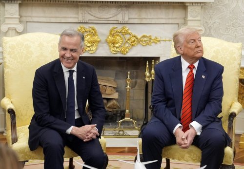Prime Minister Mark Carney and U.S. President Donald Trump engage in a meeting at the White House in Washington, D.C., Tuesday, May 6, 2025. THE CANADIAN PRESS/Adrian Wyld