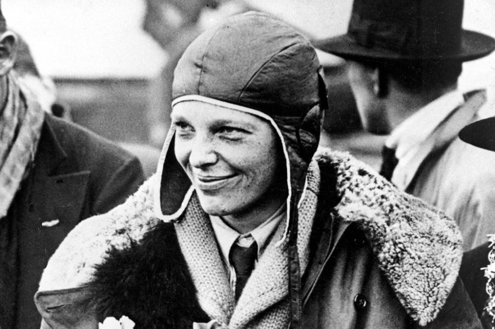 FILE - Amelia Earhart poses for photos as she arrives in Southampton, England, after her transatlantic flight on the