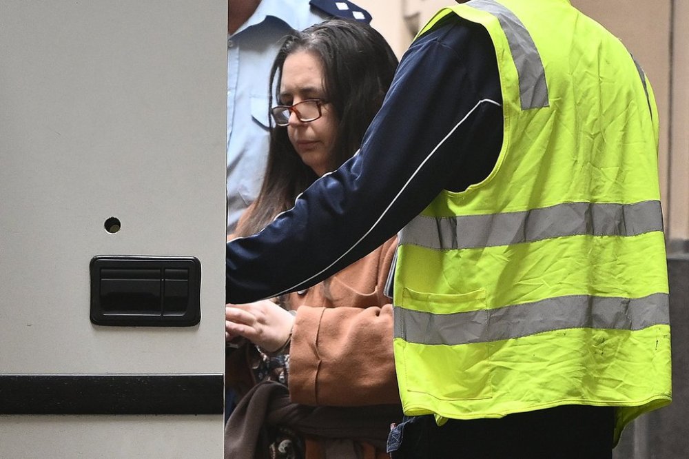 Erin Patterson is escorted away from the Supreme Court of Victoria in Melbourne, Australia, on Sept. 8, 2025. (Joel Carrett/AAP Image via AP)