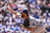 FILE - Los Angeles Dodgers relief pitcher Michael Kopech works against the Colorado Rockies in the eighth inning of a baseball game, June 26, 2025, in Denver. (AP Photo/David Zalubowski)