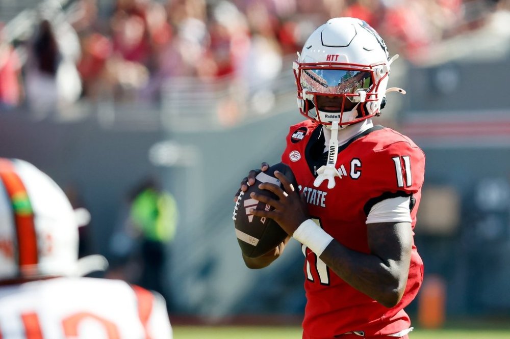 North Carolina State quarterback CJ Bailey (11) prepares to pass the ball against Campbell during the first half of an NCAA college football game in Raleigh, N.C., Saturday, Oct. 4, 2025. (AP Photo/Karl DeBlaker)
