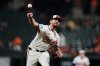 Baltimore Orioles starting pitcher Dean Kremer delivers during the first inning of a baseball game against the Tampa Bay Rays, Tuesday, Sept. 23, 2025, in Baltimore. (AP Photo/Stephanie Scarbrough)