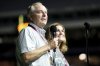Texas A&M University President Mark A. Welsh, left, addresses the crowd inside Kyle Field as his wife Betty looks on during Midnight Yell in College Station, Texas, Saturday, Aug. 30, 2025. (AP Photo/Sam Craft, File)