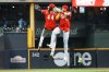Cincinnati Reds' Elly De La Cruz and Noelvi Marte celebrate after a baseball game against the Milwaukee Brewers Saturday, Sept. 27, 2025, in Milwaukee. (AP Photo/Morry Gash)
