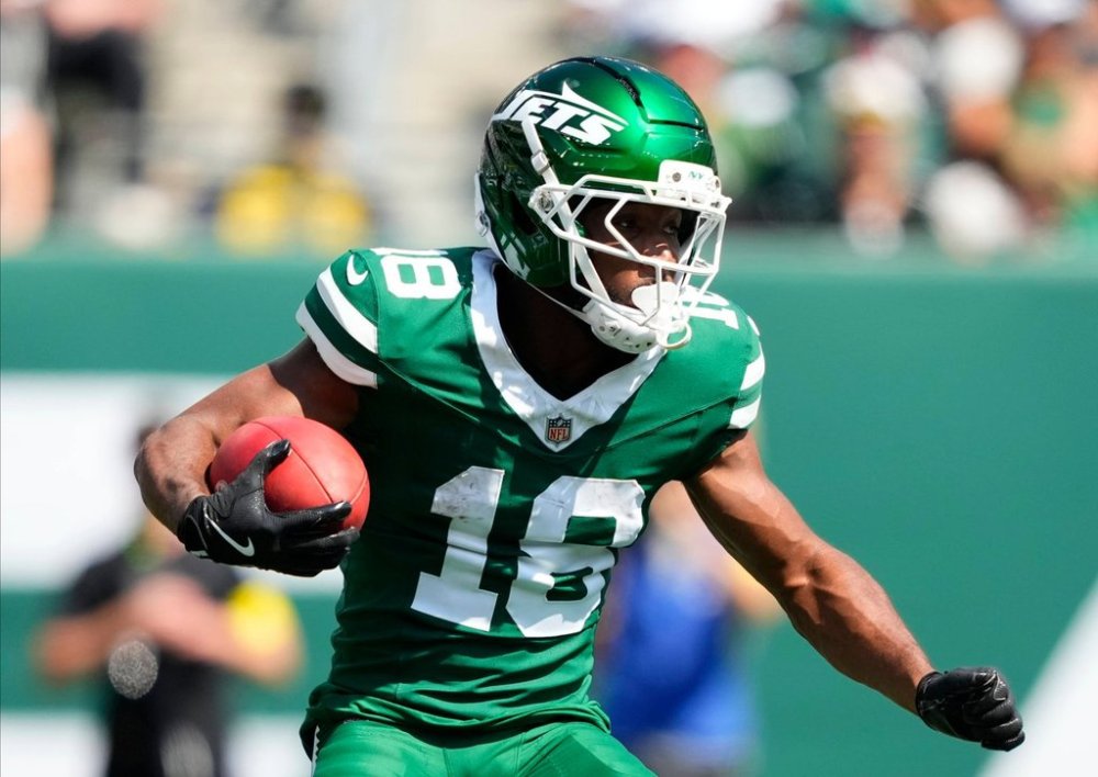 FILE - New York Jets wide receiver Isaiah Williams (18) carries the ball against the Buffalo Bills during the first quarter of an NFL football game, Sept. 14, 2025, in East Rutherford, N.J. (AP Photo/Yuki Iwamura, File)