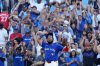 Toronto Blue Jays first base Vladimir Guerrero Jr. (27) celebrates as the Toronto Blue Jays win the American League East Division title over the Tampa Bay Rays following MLB baseball action in Toronto, Sunday, Sept. 28, 2025. THE CANADIAN PRESS/Chris Young