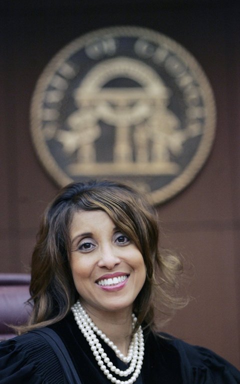 FILE - Fulton County Superior Court Judge Penny Brown Reynolds poses in her courtroom on March 27, 2008 in Atlanta. (AP Photo/John Bazemore, File)