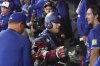 Blue Jays outfielder Daulton Varsho (5) celebrates in the dugout after hitting a grand slam off Boston Red Sox pitcher Justin Wilson during the sixth inning of a Major League Baseball game in Toronto on Sept. 25, 2025. THE CANADIAN PRESS/Chris Young