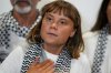 Swedish activist Greta Thunberg speaks as she arrives at the Eleftherios Venizelos International Airport in Athens, Monday, Oct. 6, 2025 after being deported from Israel for taking part in a Gaza-bound aid flotilla. (AP Photo/Petros Giannakouris)