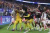 Canada celebrates their win over Venezuela in a Copa America quarterfinal soccer match in Arlington, Texas, Friday, July 5, 2024. (AP Photo/Richard Rodriguez)