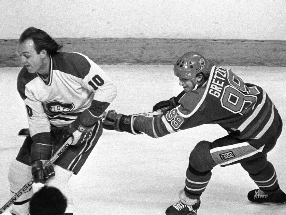 Wayne Gretzky of the Edmonton Oilers tries to stop Guy Lafleur during a tie on March 2, 1982, at the Montreal Forum. Neither scored in that game, but they both had two assists in a 3-3 tie. THE CANADIAN PRESS/Ryan Remiorz