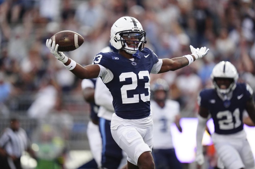 Penn State cornerback Jahmir Joseph (23) celebrates a pick-six during the fourth quarter of an NCAA college football game against Villanova, Saturday, Sept. 13, 2025, in State College, Pa. (AP Photo/Jared Freed)