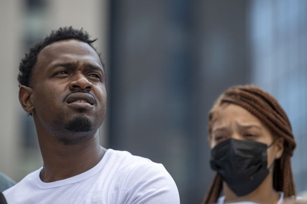 FILE - Secoriey Williamson, left, Charmaine Turner, parents of Secoriea Turner, attend a news conference outside of the Fulton County Courthouse in downtown Atlanta, Friday, Aug. 13, 2021. (Alyssa Pointer/Atlanta Journal-Constitution via AP, File)