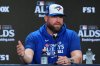 Toronto Blue Jays manager John Schneider talks to reporters at Yankee Stadium in New York, Monday, Oct. 6, 2025. (AP Photo/Seth Wenig)